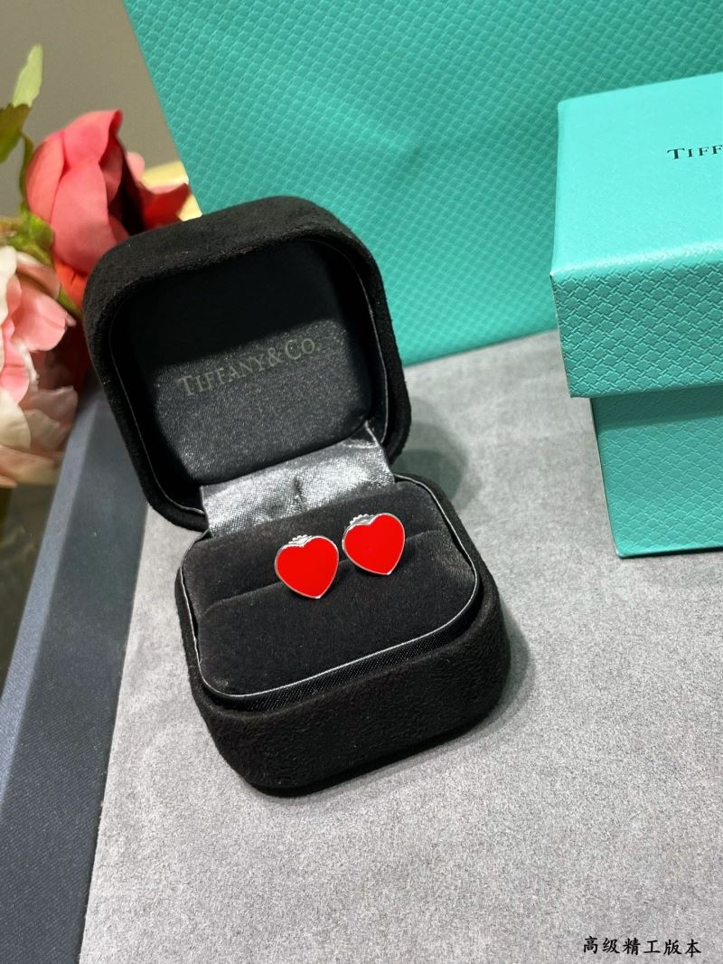 T*f*ny earrings
